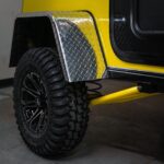 yellow offroad teardrop camper trailer wheel and fender